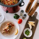 This Slow Cooker Chicken Fajita is an easy, yet delicious meal to make during those busy weeks. Just dump all the ingredients into a slow cooker, stir every few hours, and you have a meal ready to go!