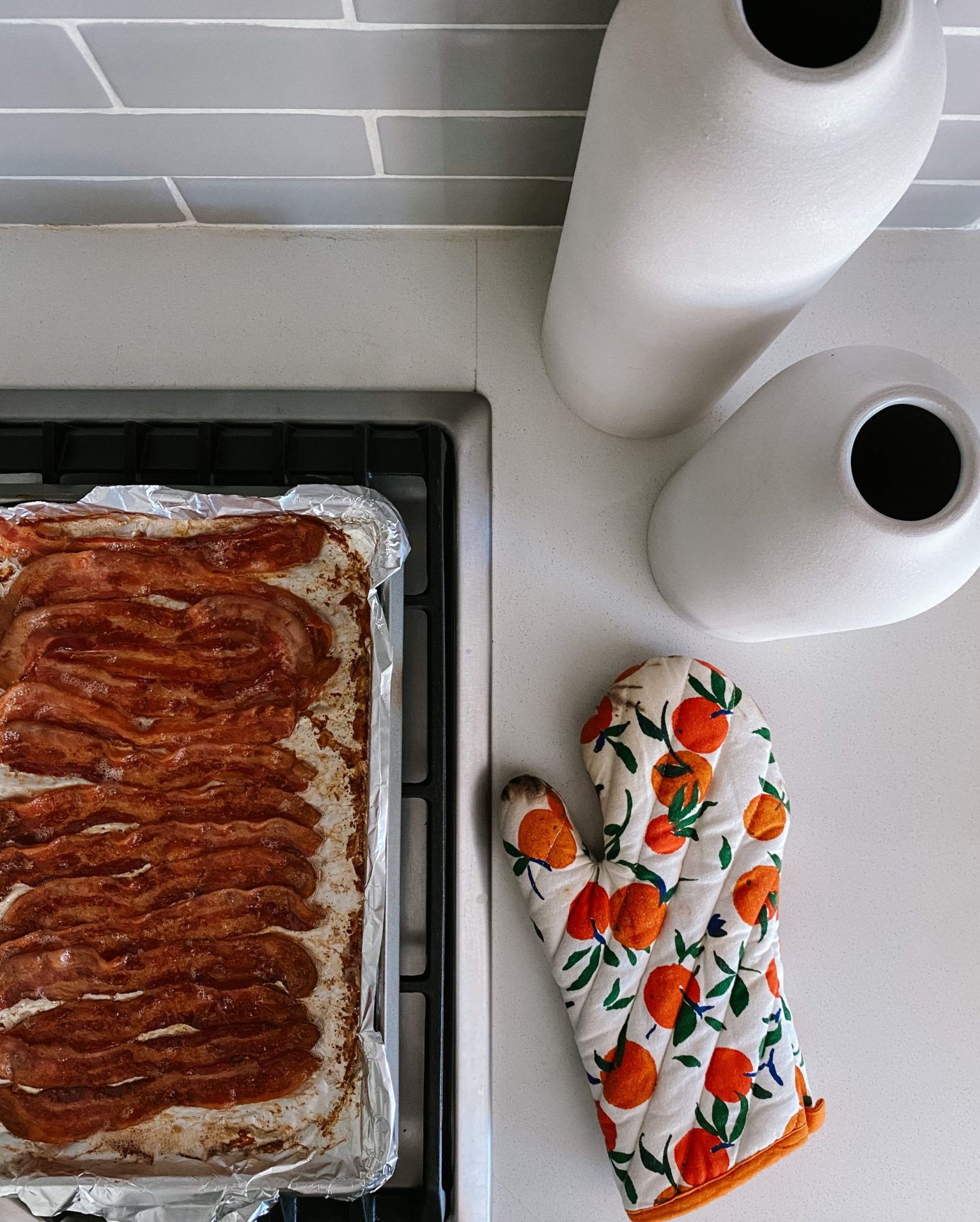 Cooking bacon in the oven makes the perfect crispy bacon! It is less messy than cooking on the stovetop, and allows you to multitask, preparing other ingredients needed for your meal.