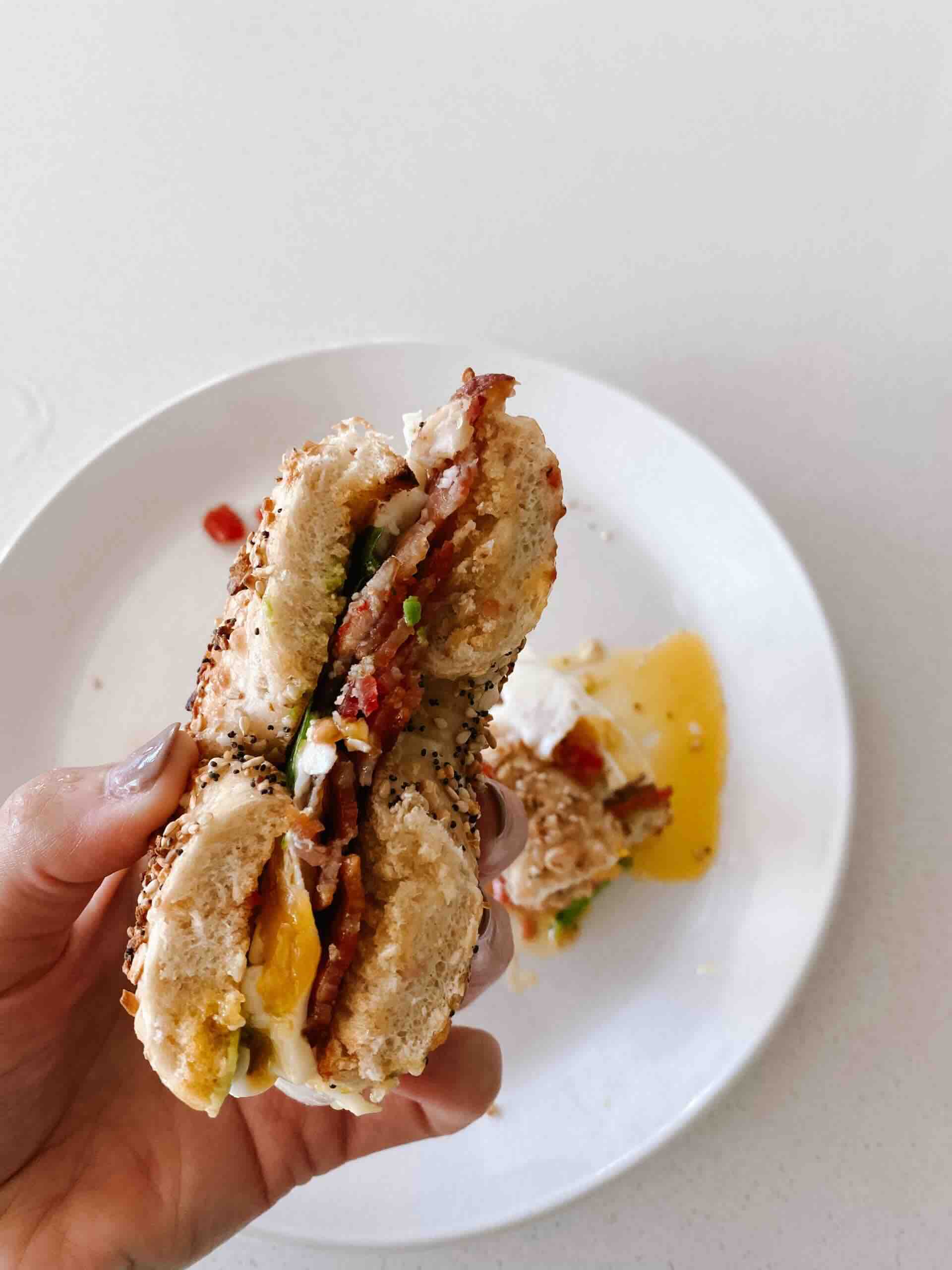 Crispy Bacon Avocado Breakfast Bagel Sandwich.