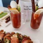 This homemade Bloody Mary Cocktail is the perfect beverage for any football Sunday. With fresh tomato juice from the garden, crispy jalapeño poppers, and crunchy pickles, this beverage will surely be a hit.