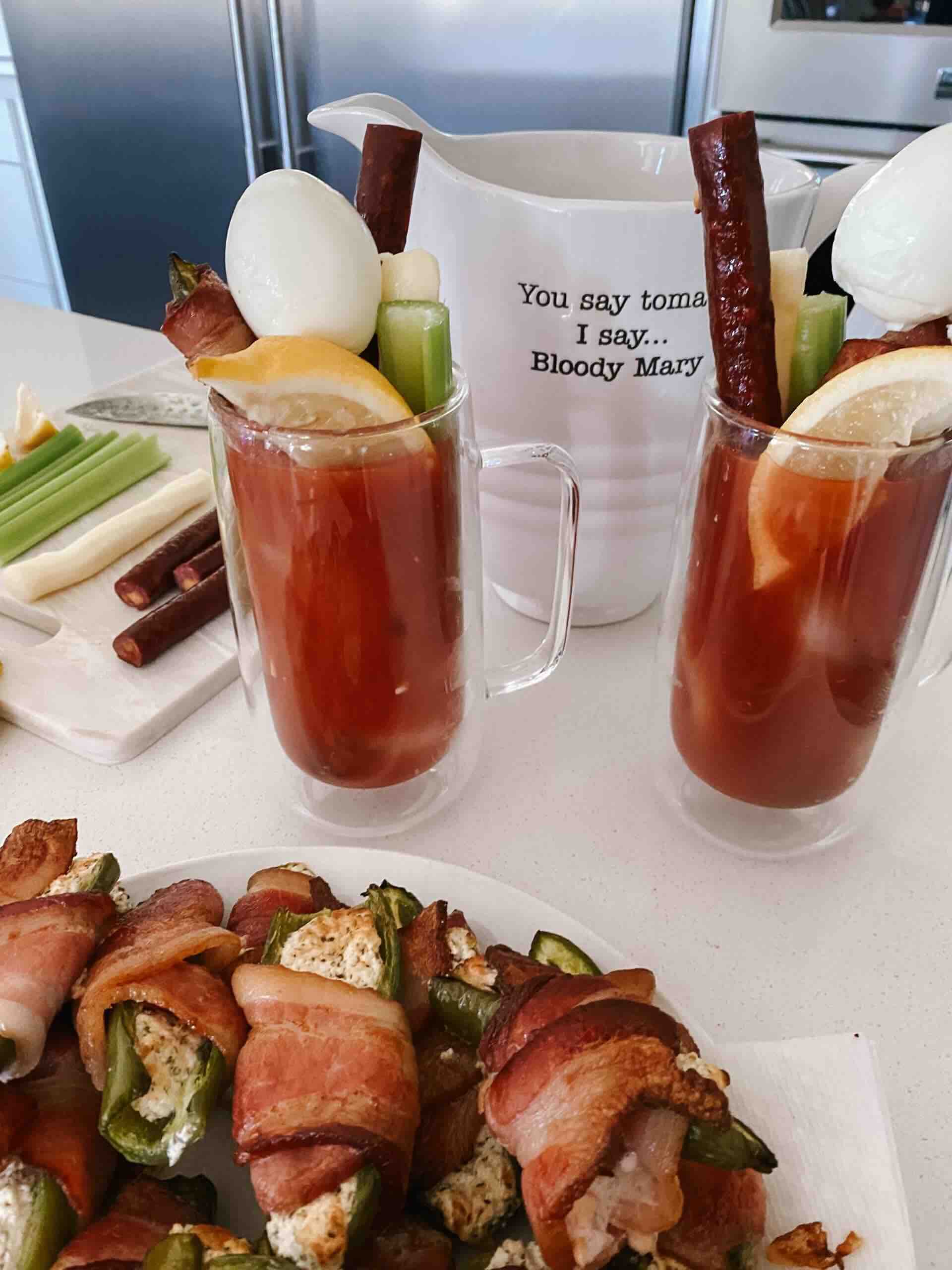 This homemade Bloody Mary Cocktail is the perfect beverage for any football Sunday. With fresh tomato juice from the garden, crispy jalapeño poppers, and crunchy pickles, this beverage will surely be a hit.