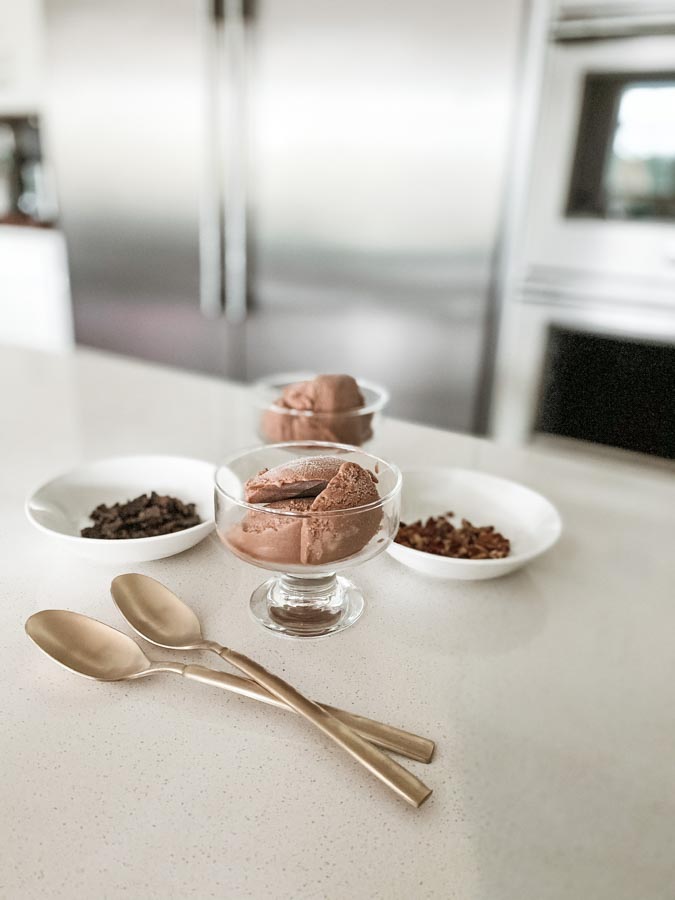 The Banana Chocolate Ice Cream is a sweet treat for hot summer days. With only a few ingredients, it tastes like the real thing without all the added calories and sugar. Just add your favorite toppings and enjoy!