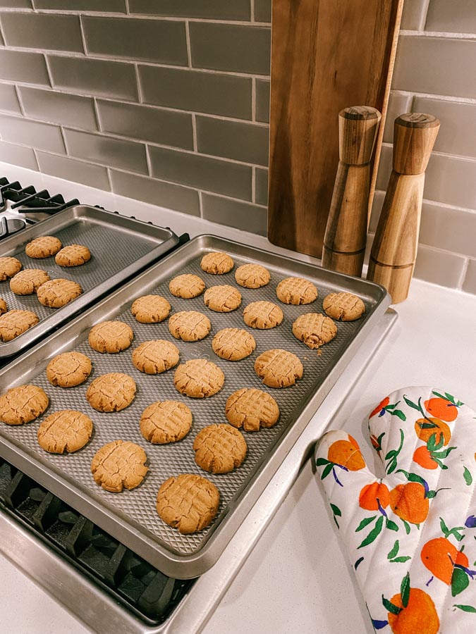 Peanut Butter Cookies are a fun homemade treat with the perfect chewy texture. They are packed with flavor but contain less than half the typical amount of sugar for a healthier cookie option.