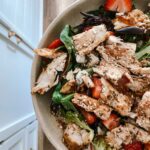 Strawberry chicken salad with red wine vinaigrette dressing.